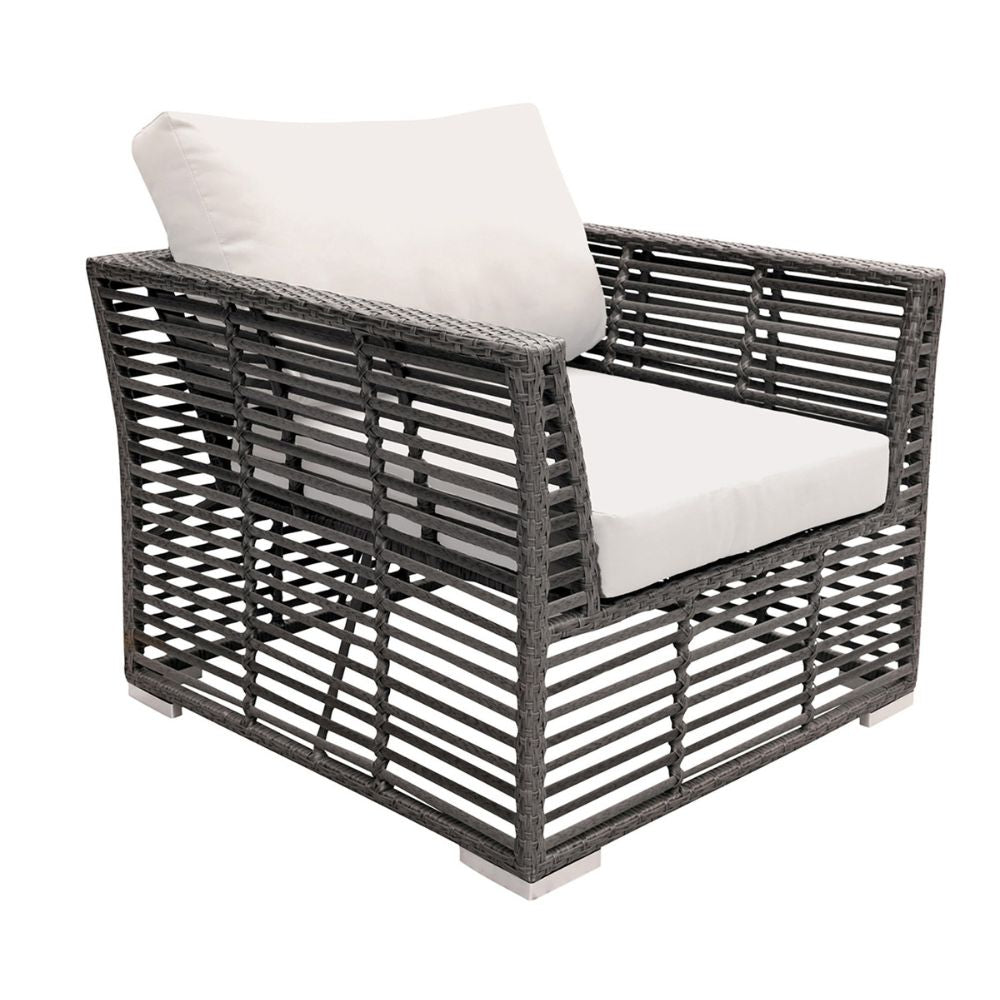 Wicker outdoor chair with white cushions on a white background