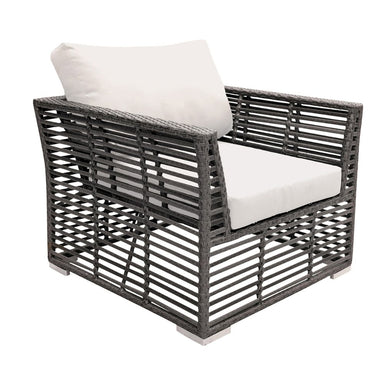 Wicker outdoor chair with white cushions on a white background