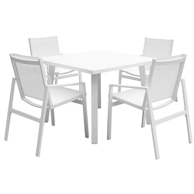 White dining table with four matching chairs on a white background
