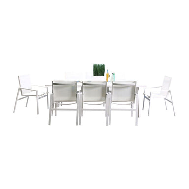 White outdoor table with four matching chairs on a white background
