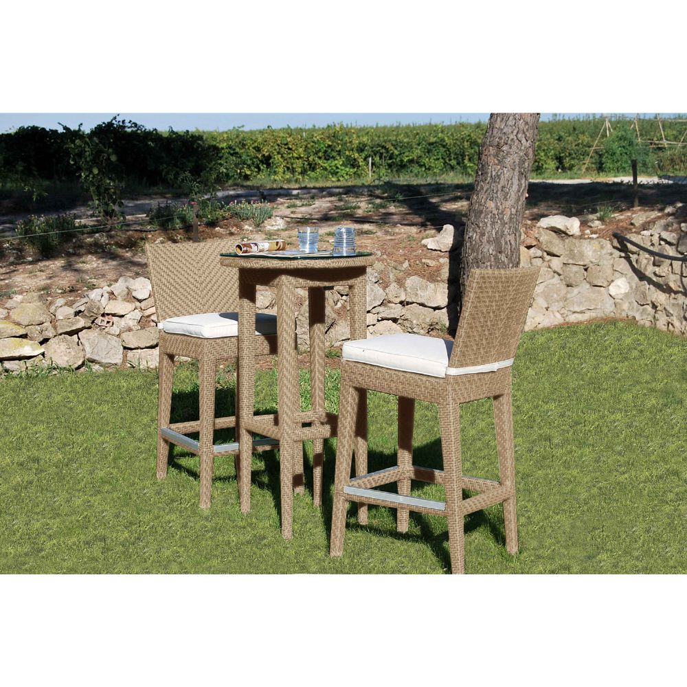 Wicker outdoor bar set with table and chairs on grass