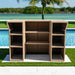 Wicker outdoor cabinet by a pool with greenery in the background