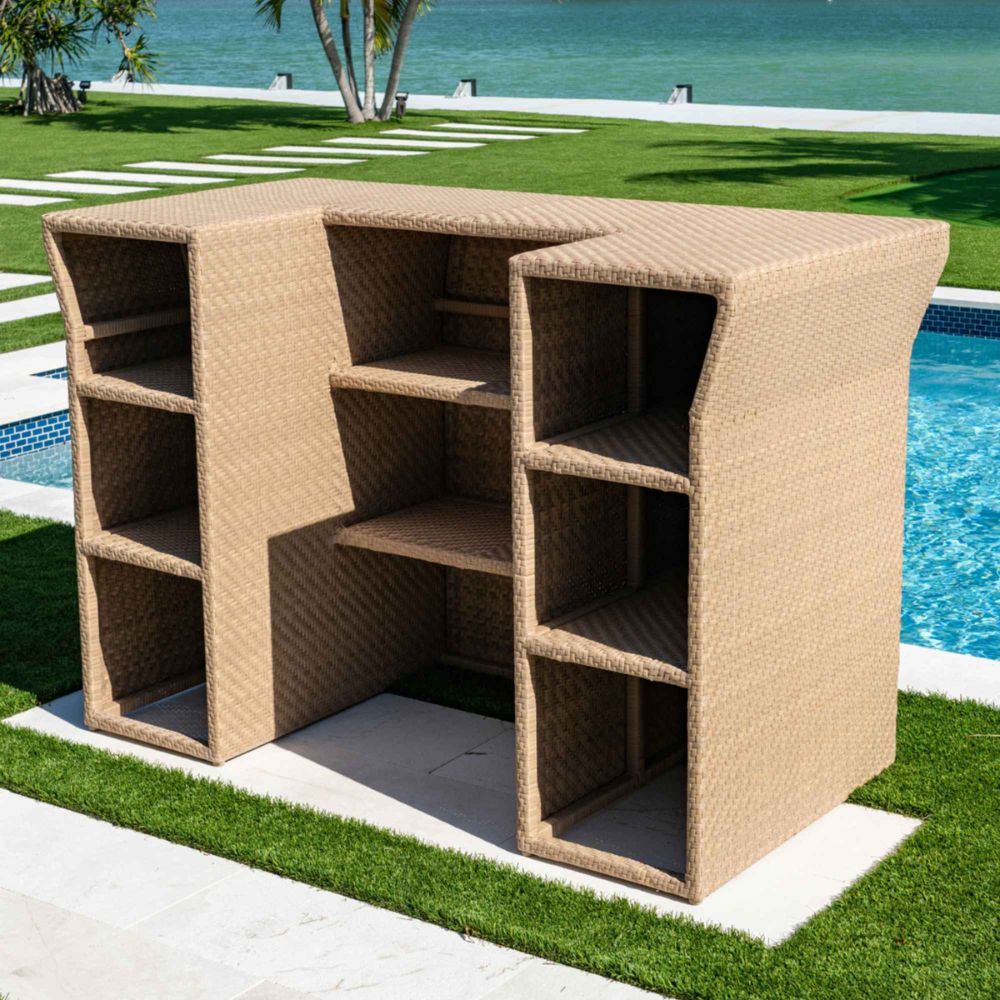 Beige outdoor storage unit with shelves by a poolside