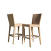 Two woven bar stools on a white background