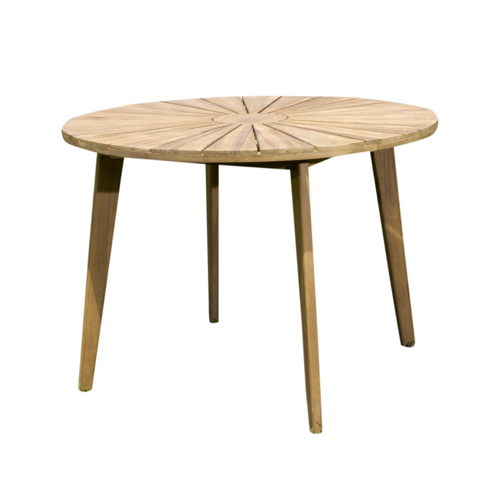 Round wooden table with a sunburst design on a white background