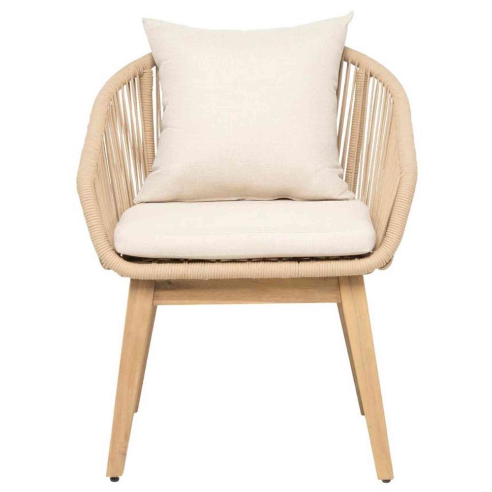 Wicker chair with white cushion on a white background