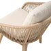 Wicker chair with beige cushions on a white background