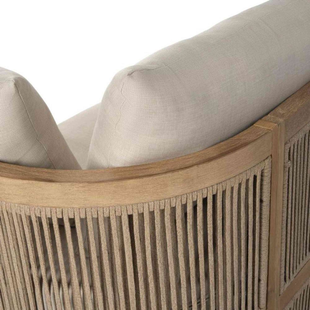 Close-up of a beige sofa with wooden frame and woven details