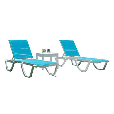 Two blue lounge chairs with a small table on a white background