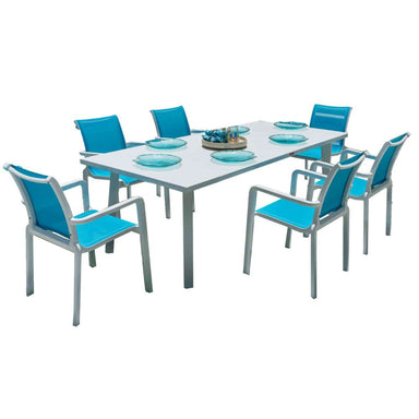 Outdoor dining set with a table and six blue chairs on a white background