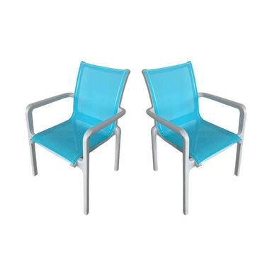 Two blue chairs with silver frames on a white background