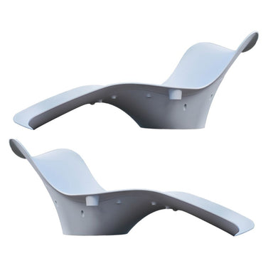 Two white curved chairs on a white background