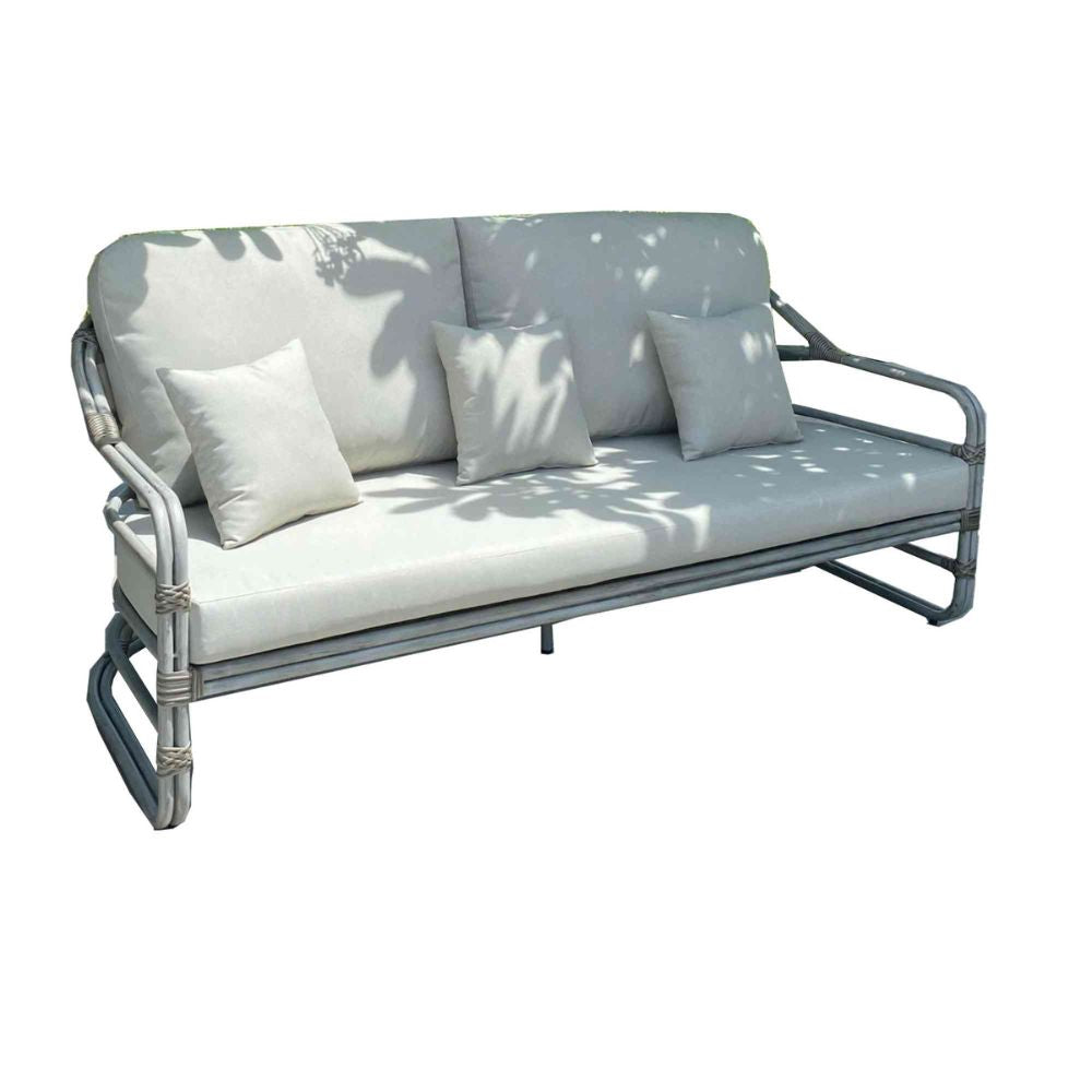 White outdoor sofa with cushions on a white background