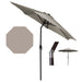 Beige patio umbrella with a black crank handle on a white background