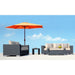 Outdoor furniture set with a sofa, armchair, and table under an orange umbrella against a blue sky.