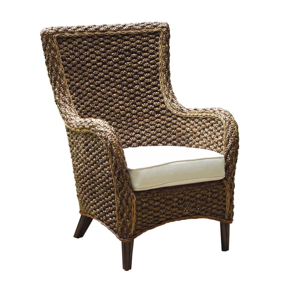 Woven armchair with a white cushion on a white background