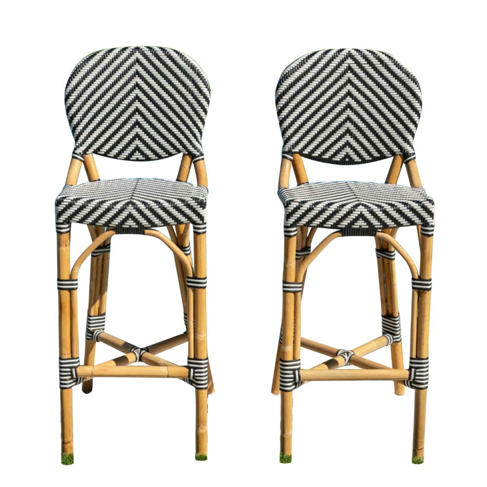 Two bamboo bar stools with striped cushions on a white background