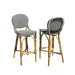 Two bar stools with black and white striped seats and backs on a white background