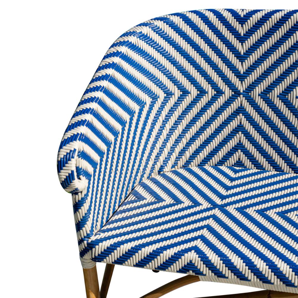 Chair with blue and white geometric pattern on a white background