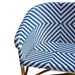 Chair with blue and white geometric pattern on a white background