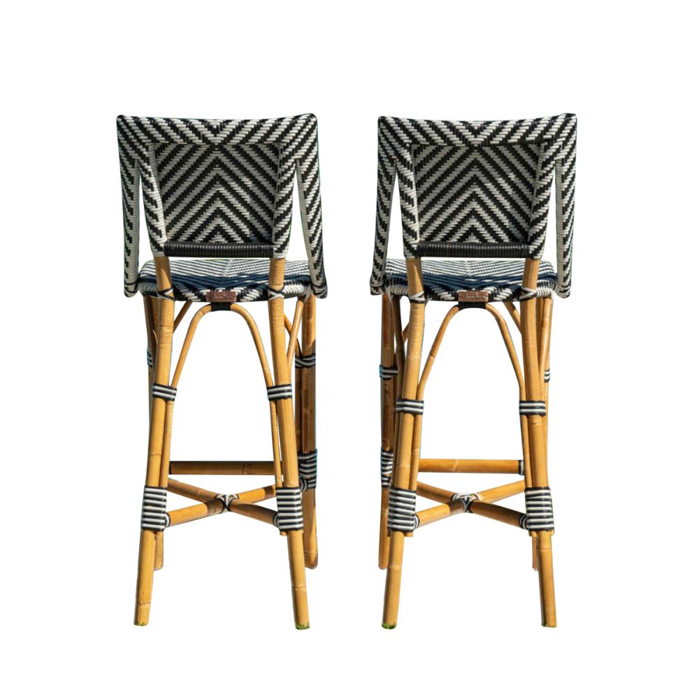 Two bar stools with wicker frames and striped backrests on a white background
