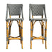 Two bamboo bar stools with striped backrests on a white background
