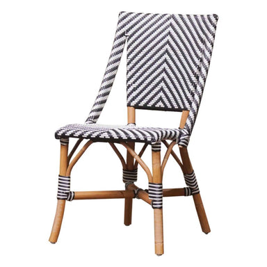Bamboo chair with black and white striped cushion on a white background
