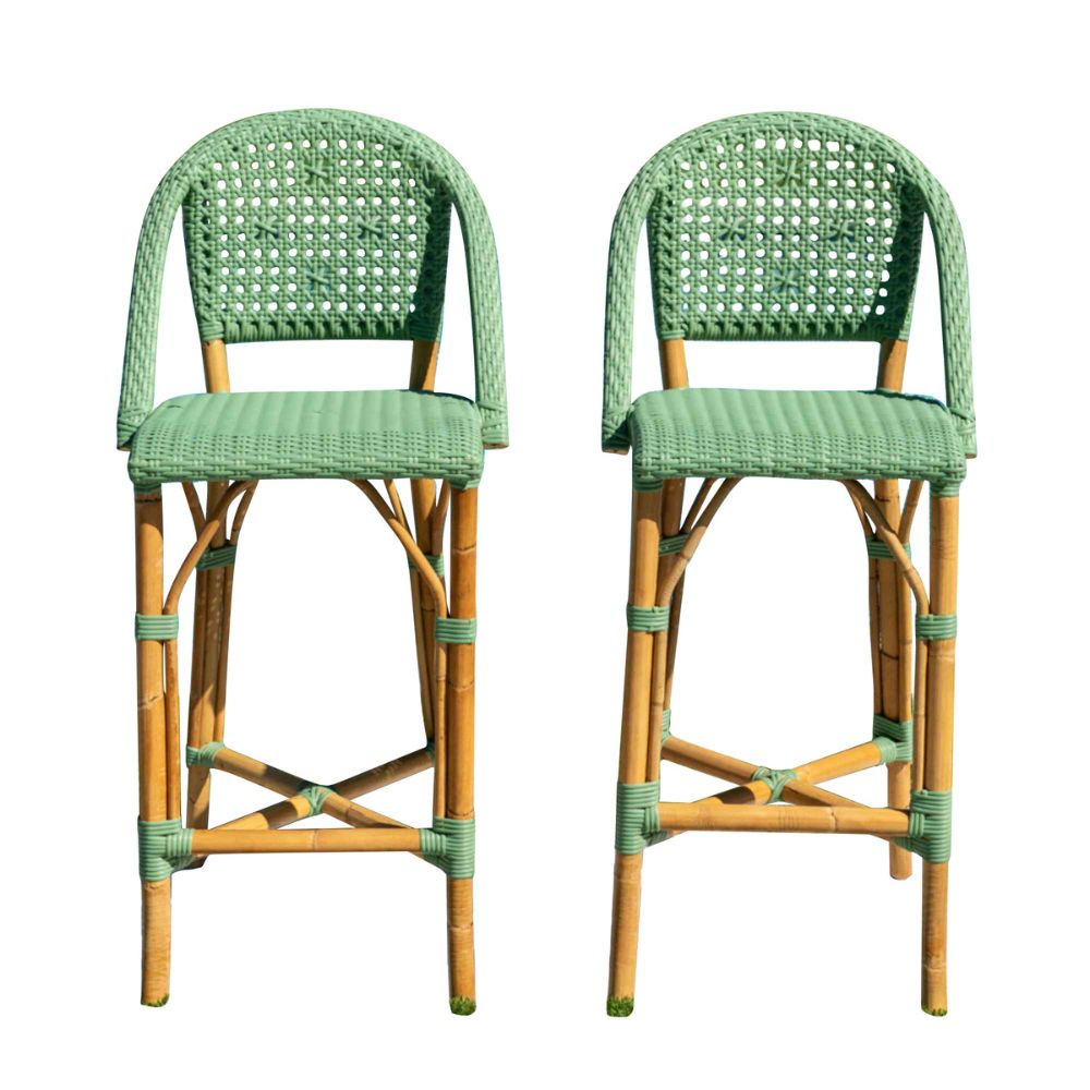 Two green wicker bar stools on a white background