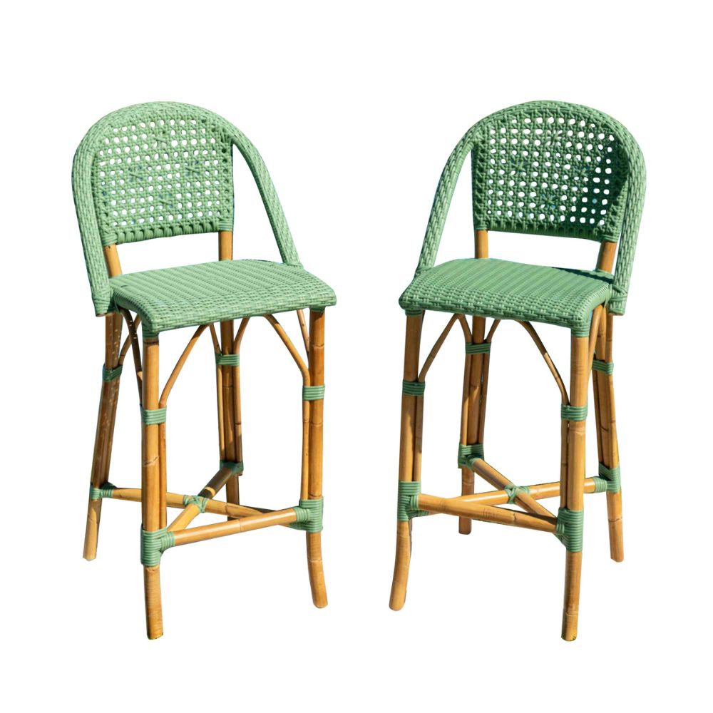 Two green wicker bar stools on a white background