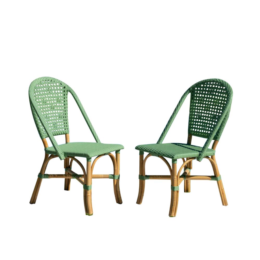 Two green wicker chairs on a white background