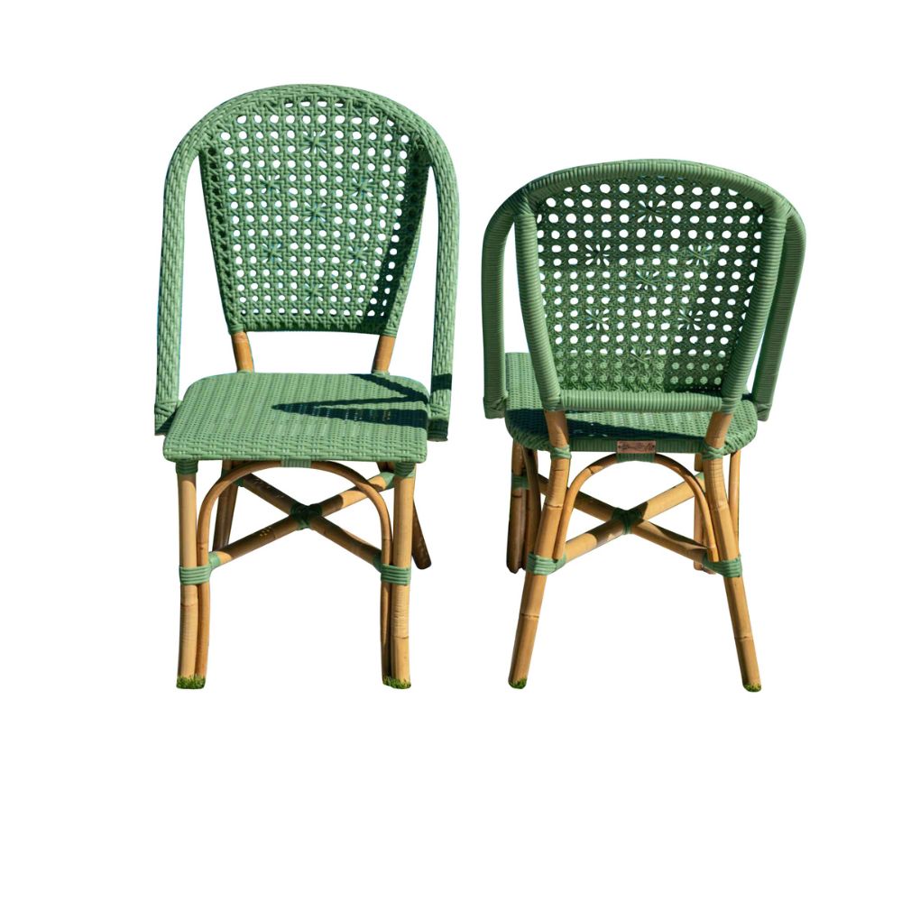 Two green wicker chairs on a white background