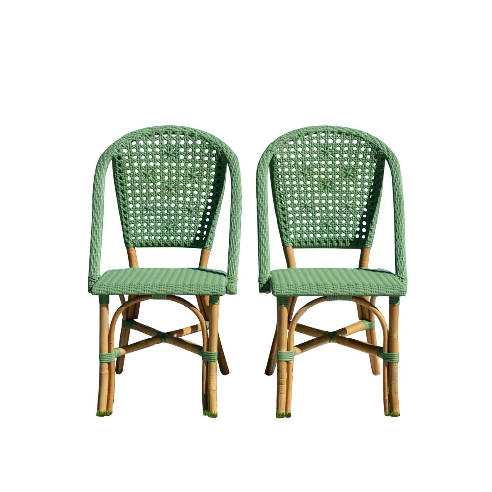 Two green wicker chairs on a white background