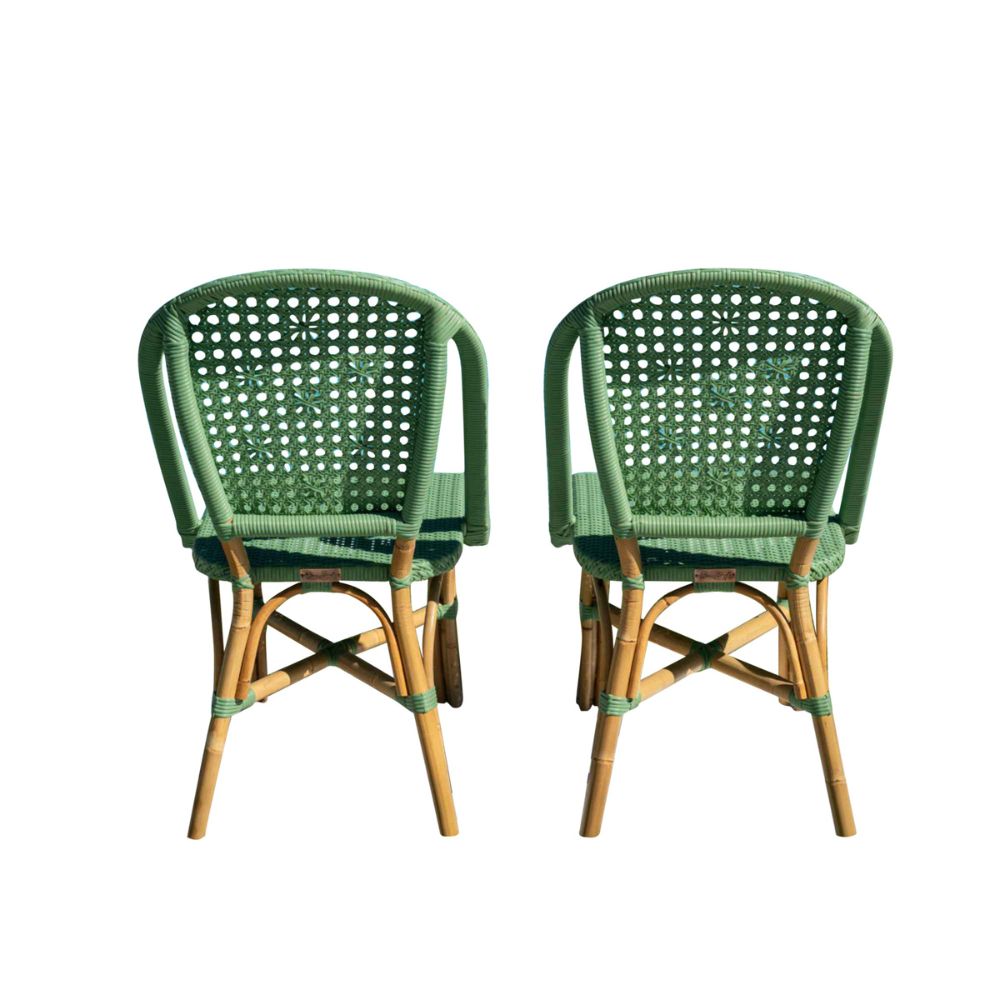 Two green wicker chairs with wooden frames on a white background