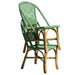 Green wicker chair on a white background
