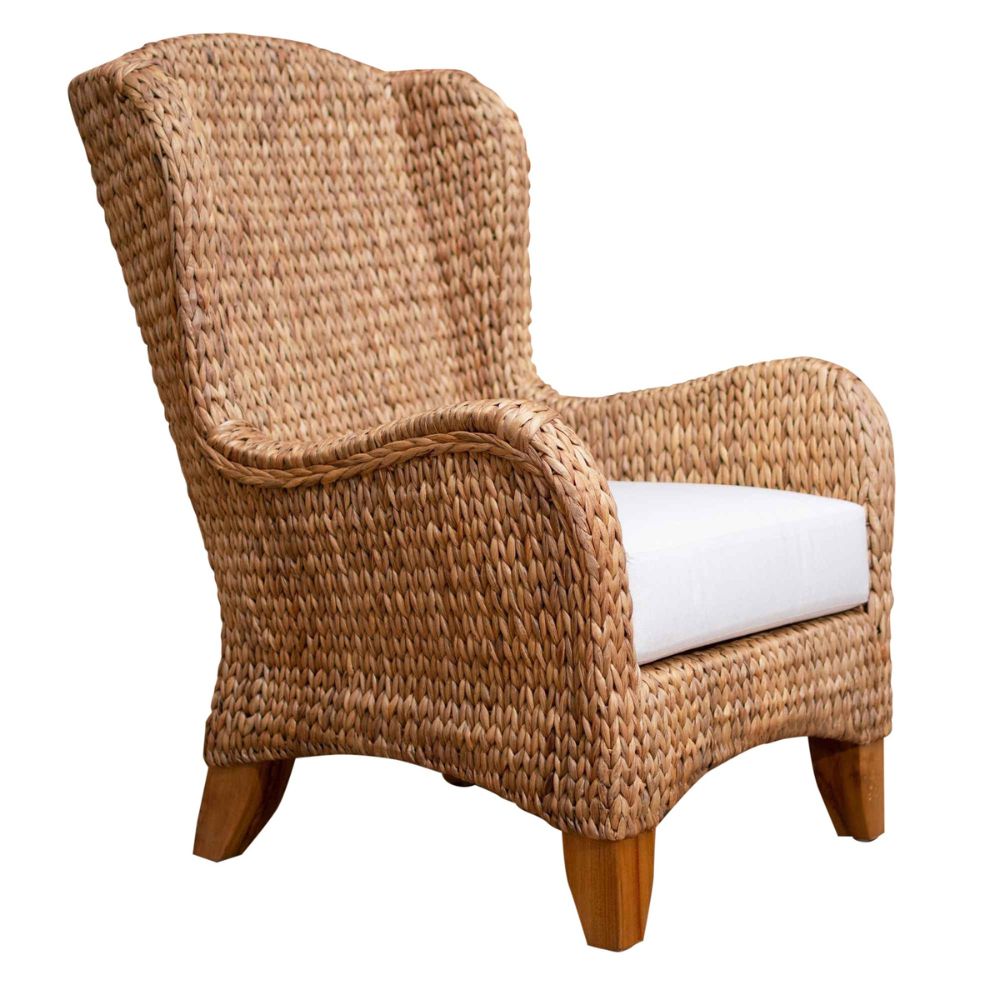 Woven armchair with a white cushion on a white background