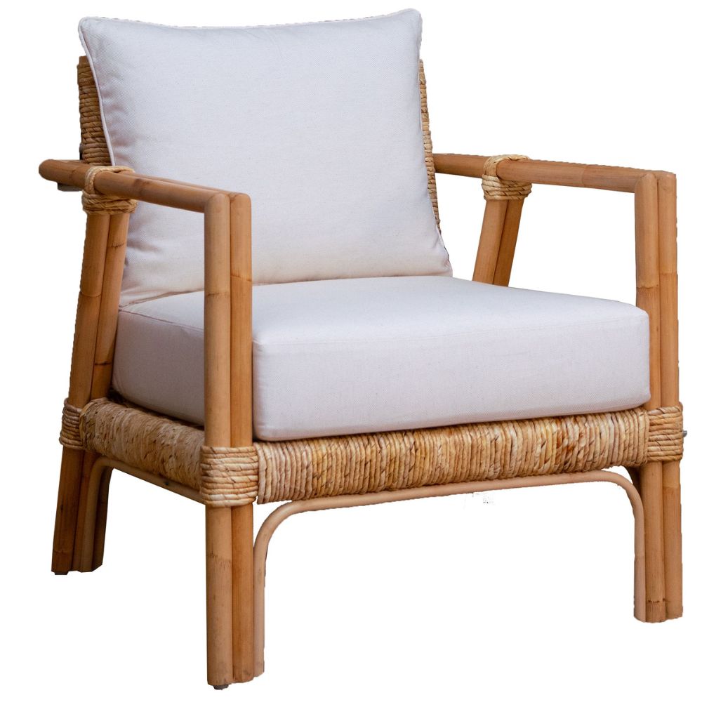 Wicker armchair with white cushions on a white background