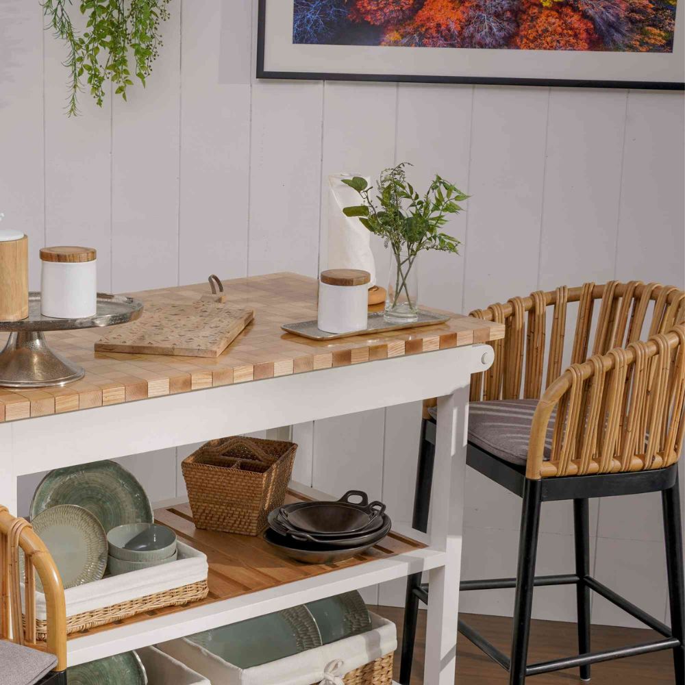 Dining area with a wooden table, chairs, and decorative items.