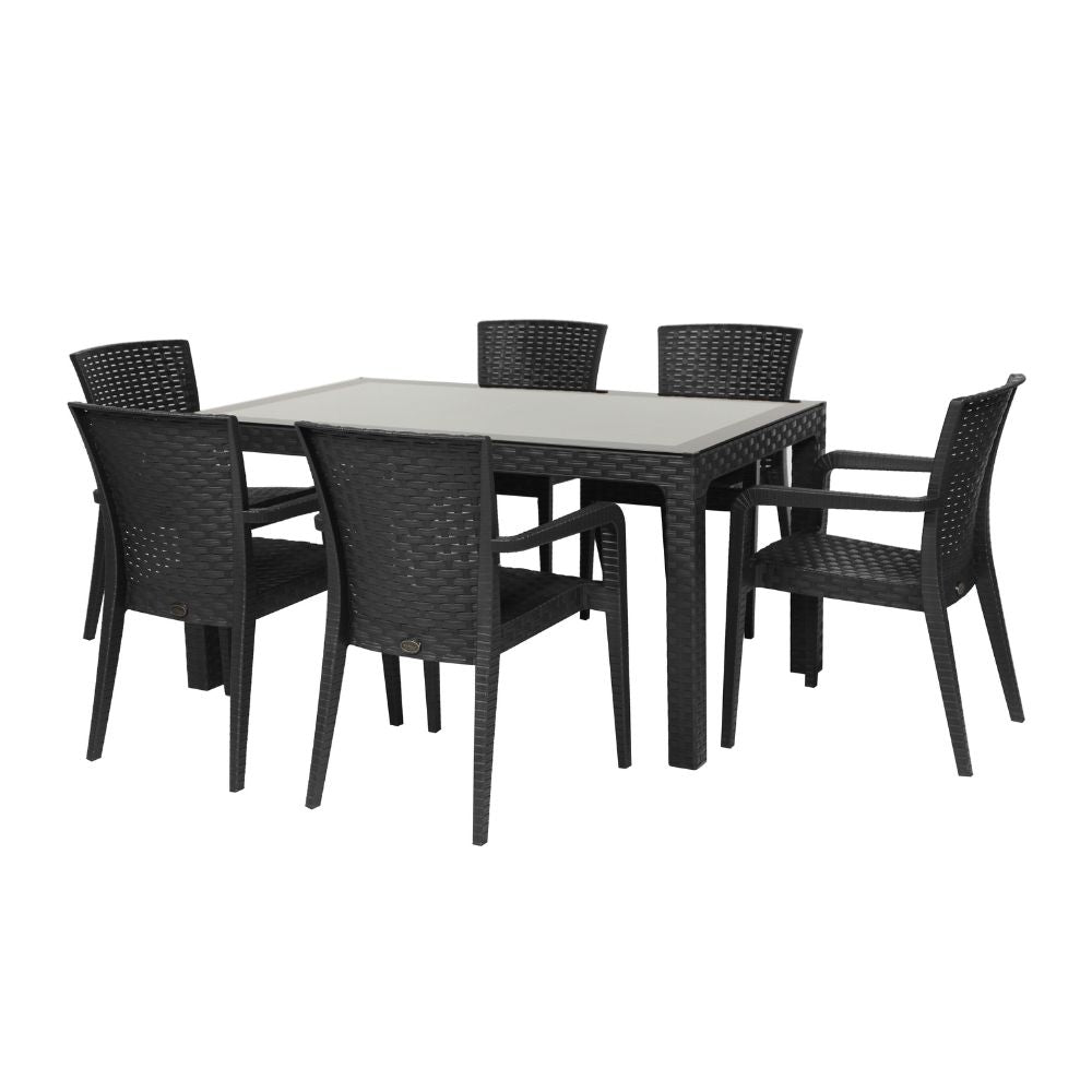 Black wicker dining set with a rectangular table and six chairs on a white background