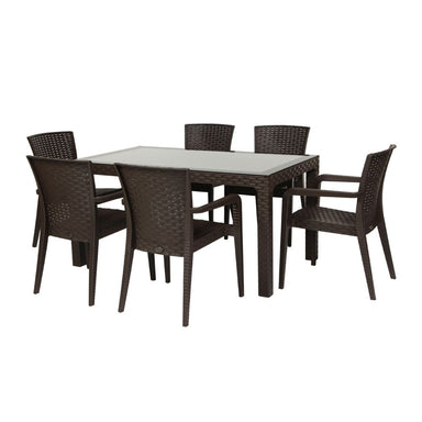 Outdoor furniture set with a rectangular table and six wicker chairs on a white background