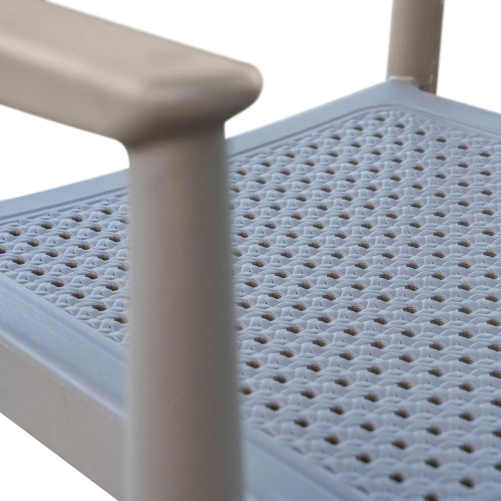 Close-up of a textured plastic step with a white background