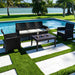 Outdoor patio set with furniture by a poolside