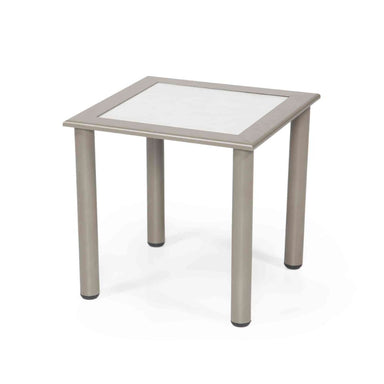 Square glass table with metal frame on a white background