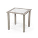 Square glass table with metal frame on a white background