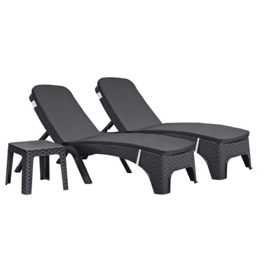 Two black wicker lounge chairs with cushions on a white background