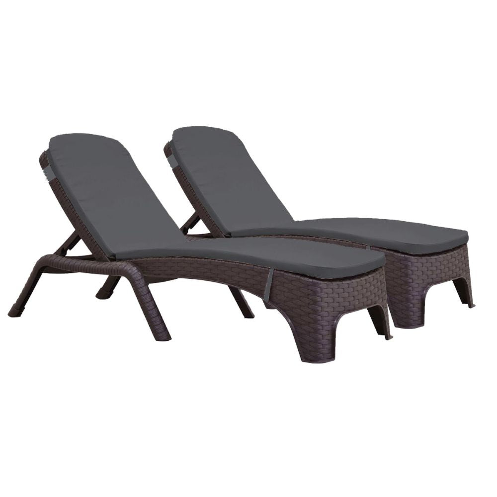 Two brown wicker lounge chairs with gray cushions on a white background