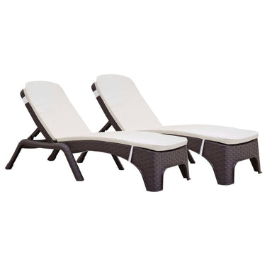 Two wicker lounge chairs with white cushions on a white background