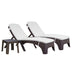 Two wicker sun loungers with white cushions on a white background