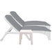 Two gray lounge chairs with white frames on a white background