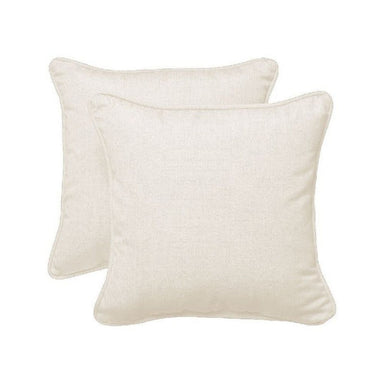 Two beige pillows on a white background